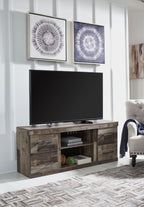 Gray TV stand with open center shelves and storage drawers for media devices