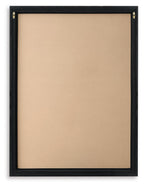 Black-framed wall art backing panel with plain beige insert