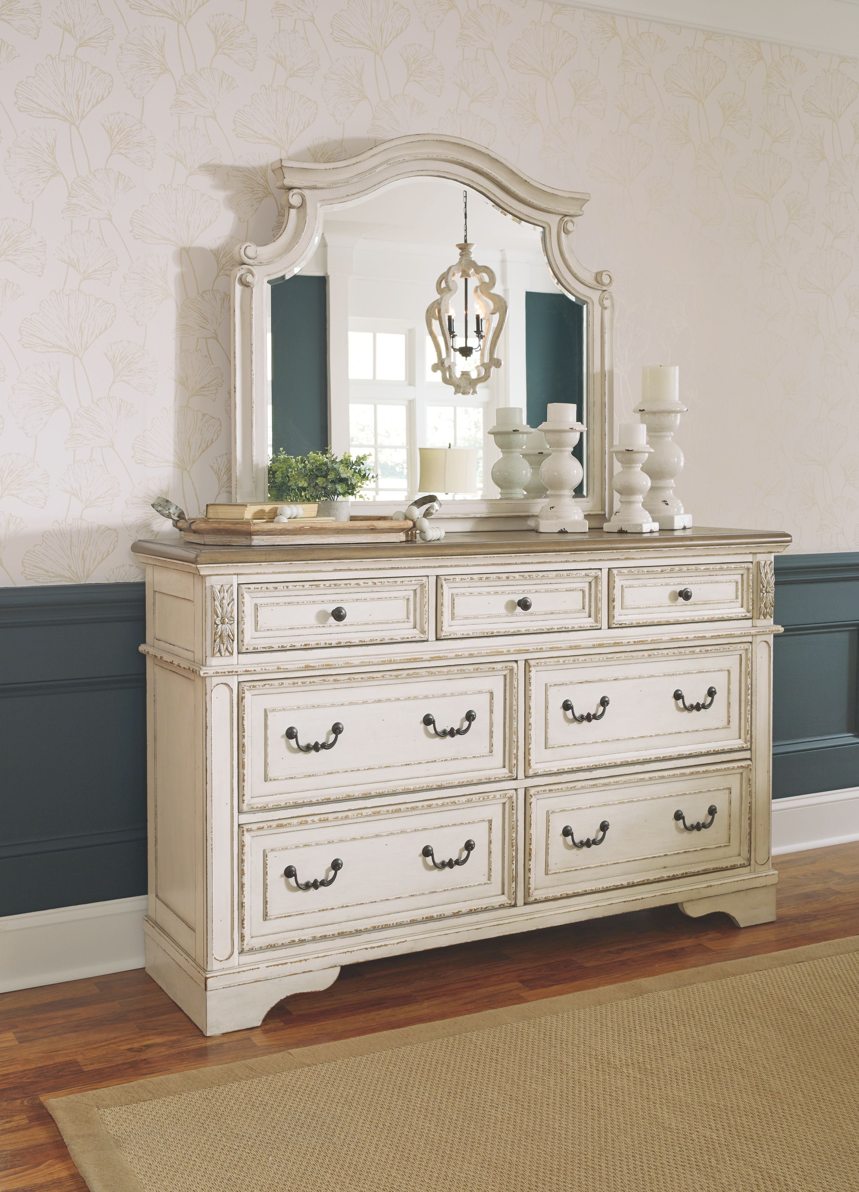 Two-tone dresser with attached mirror and six drawers, dark metal cup handles.