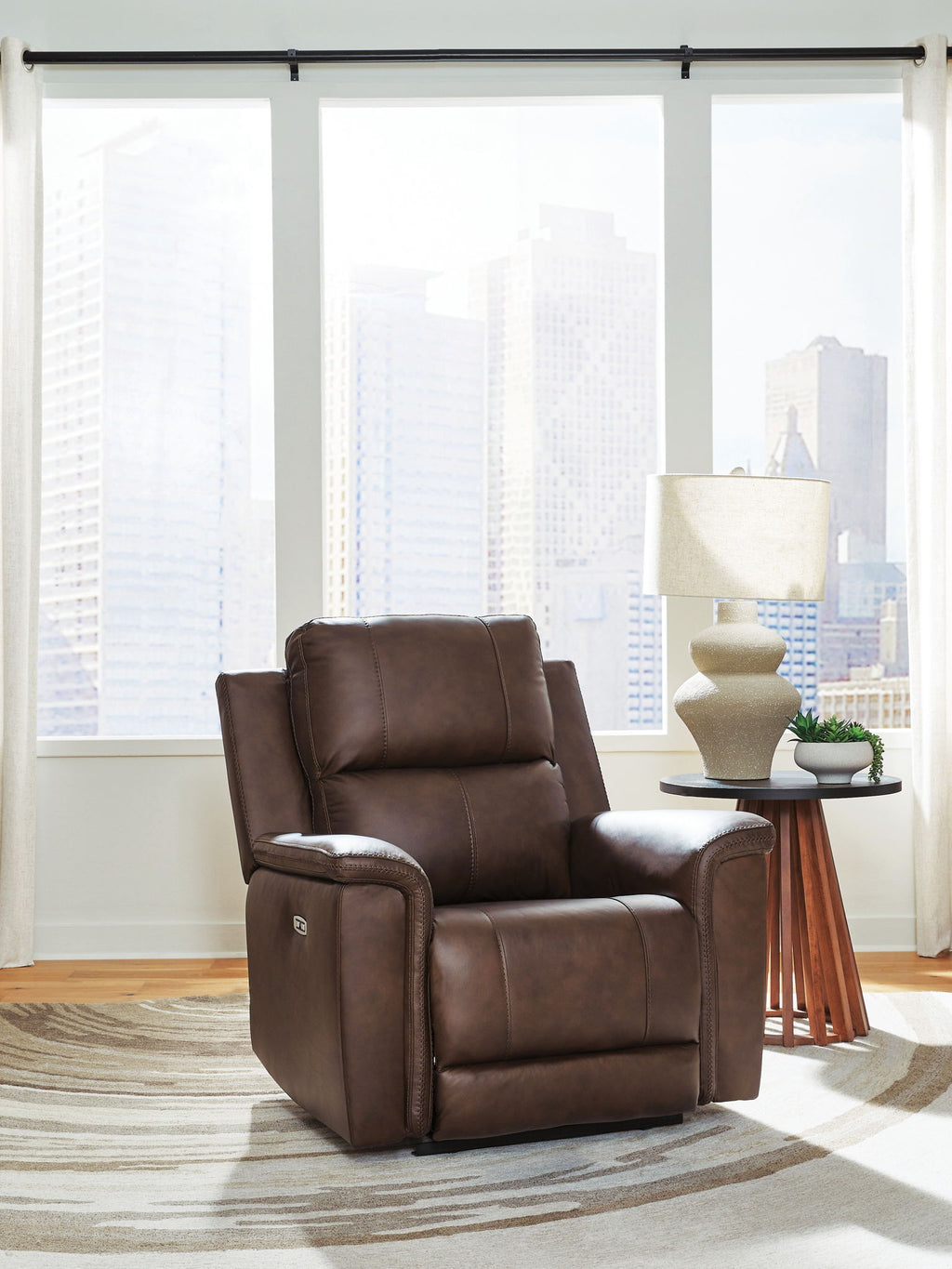 Espresso brown power recliner with adjustable headrest, full chair view