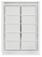 White five-drawer chest with lattice border and vertical divider on each drawer