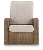 Beige fabric upholstered recliner chair with woven wicker frame, front view