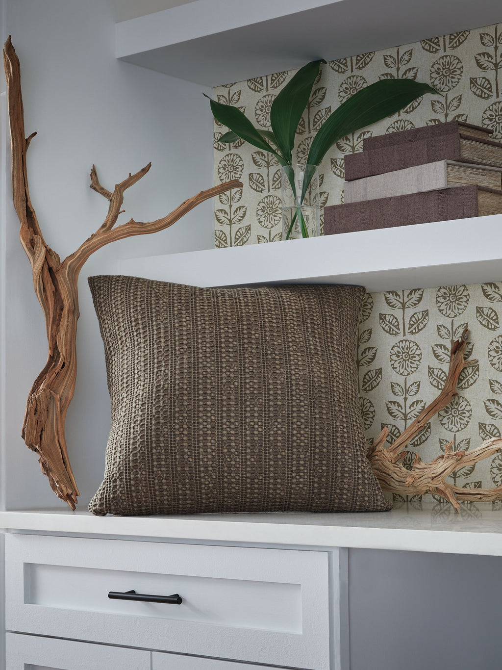 Dark brown textured throw pillow with vertical woven stripe pattern