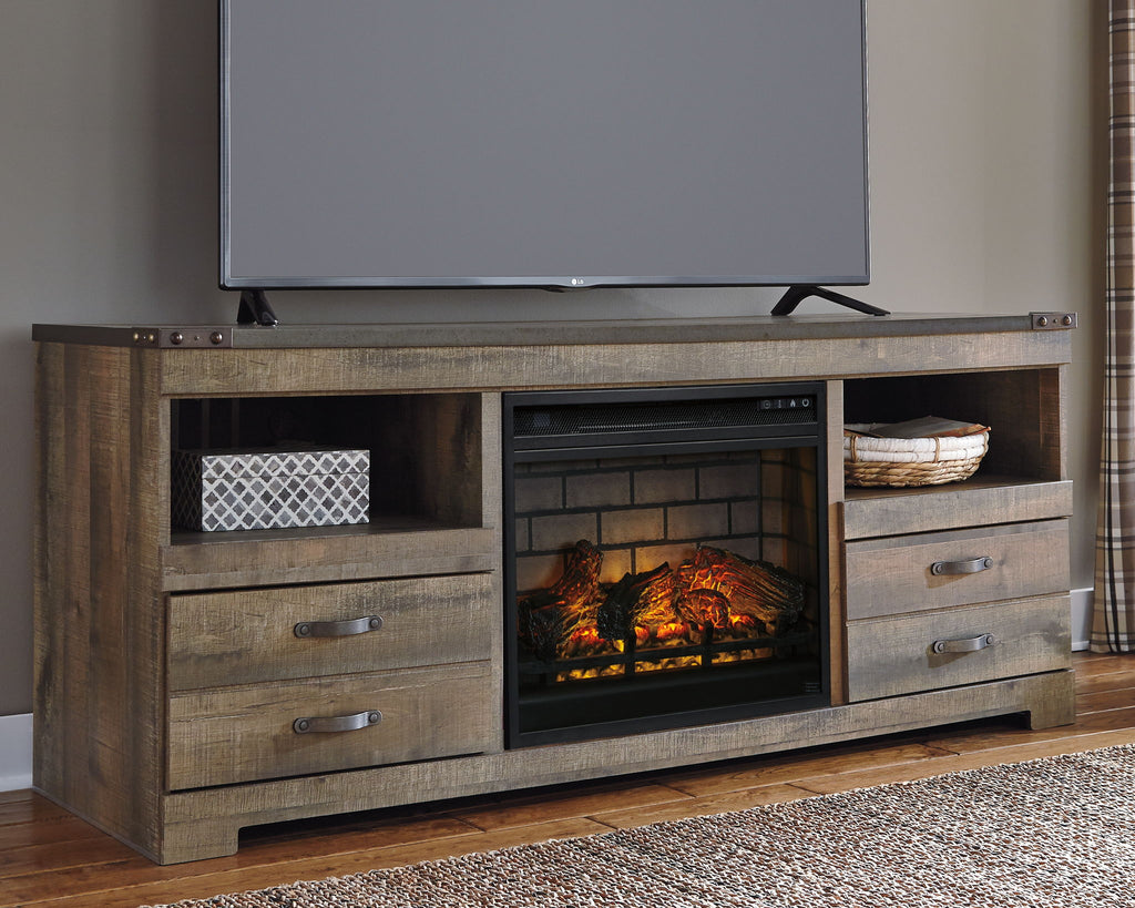 Brown wood TV stand with fireplace insert, media shelf, and two center drawers