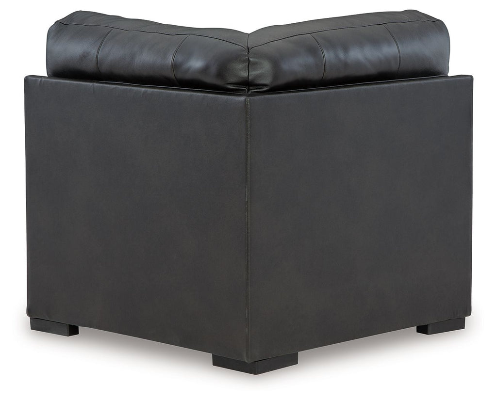 Dark gray leather-look wedge armchair with back panel and square legs