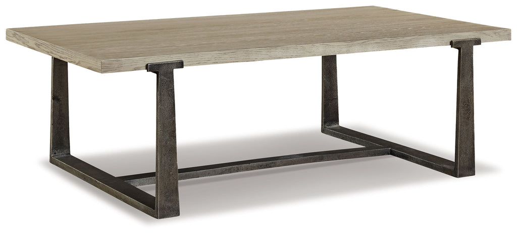 Gray rectangular cocktail table with slanted dark metal base and squared legs