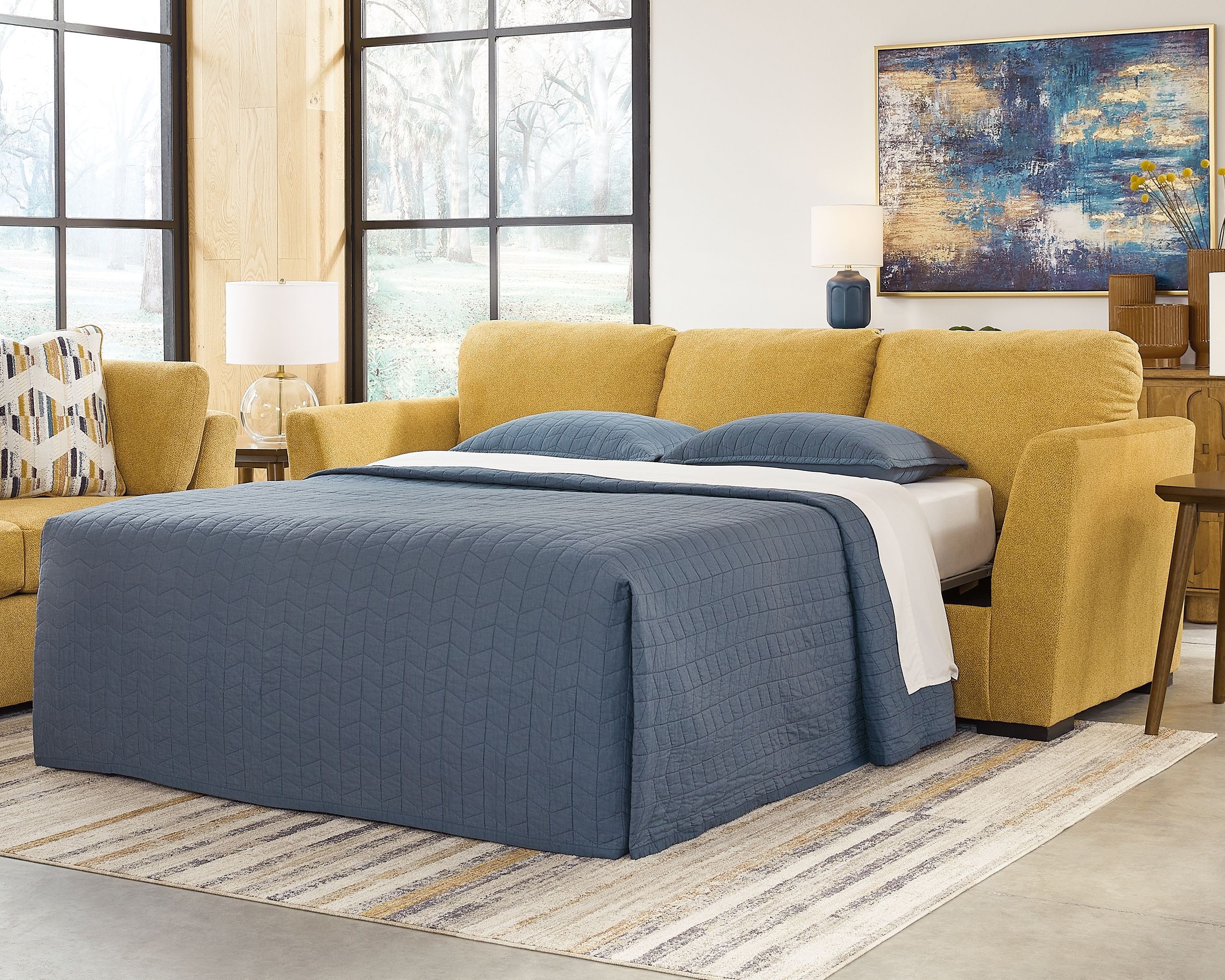 Sunflower sofa sleeper with pull-out bed and dark blue mattress cover