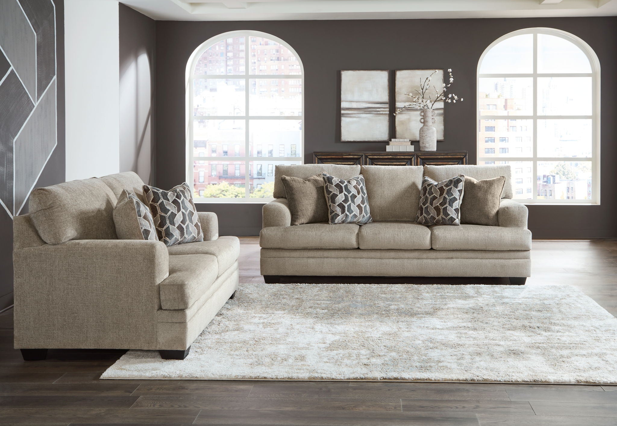 Taupe fabric sectional sofa set with chaise, sofa cushions, and accent pillows
