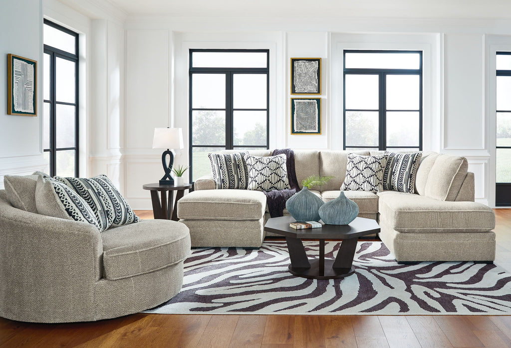 Beige sectional corner chaise sofa with patterned pillows and multiple matching chaise seats