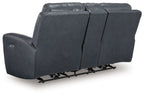Blue power reclining loveseat with adjustable headrests, side view