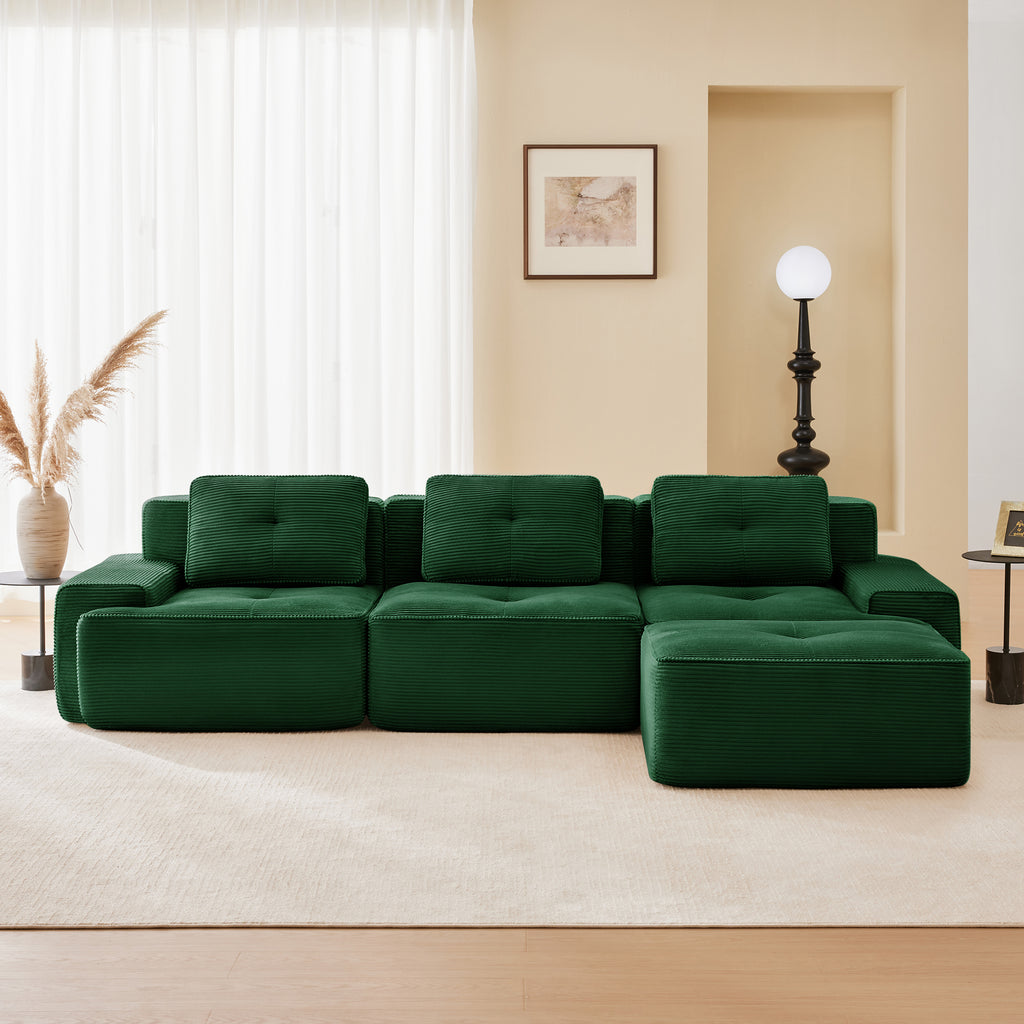 Green corduroy modular sectional sofa with three back cushions and ottoman sections