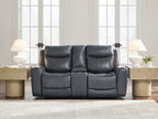Blue power reclining loveseat with console and adjustable headrests