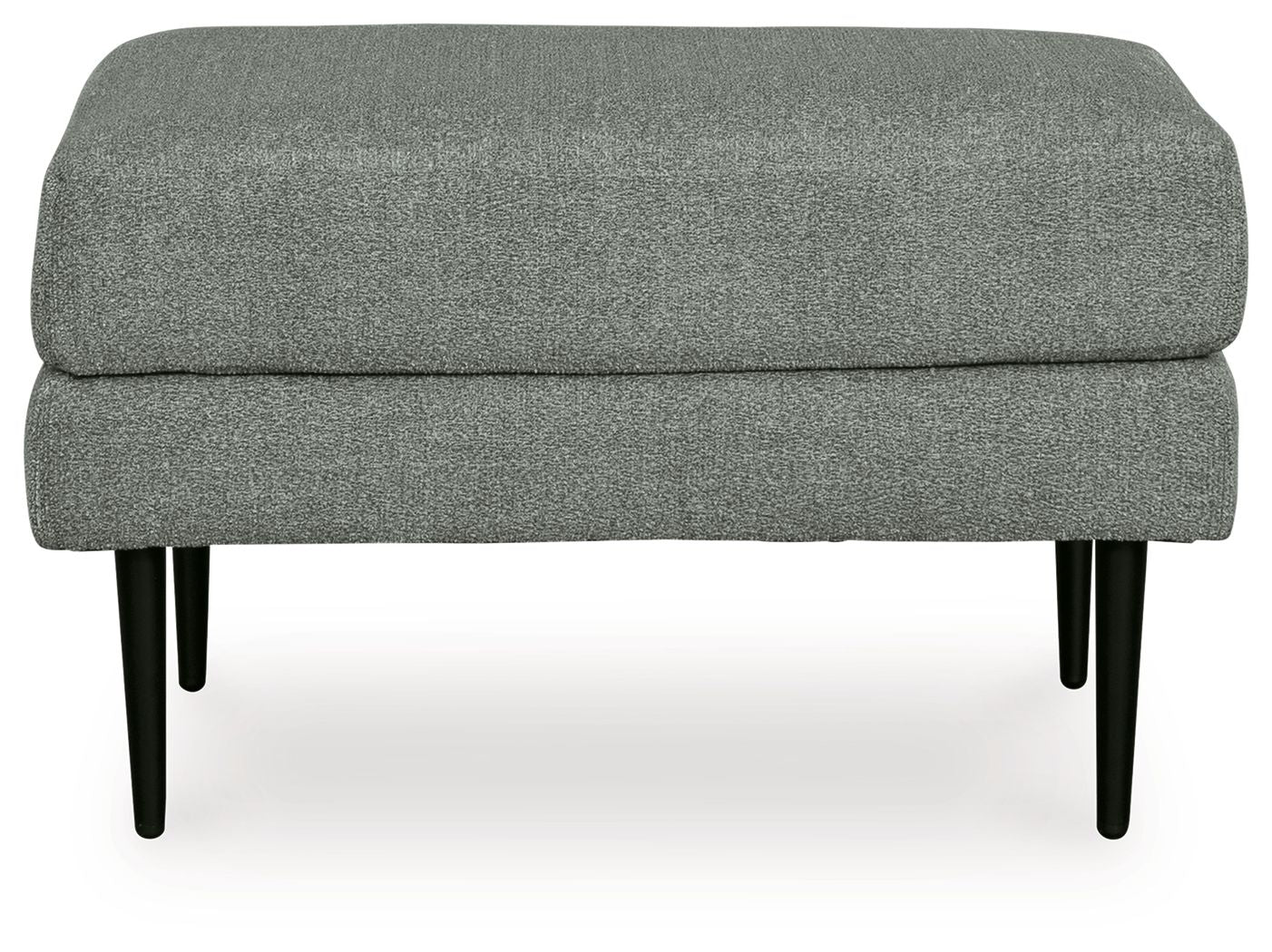 Charcoal upholstered ottoman with visible seam line and tapered black legs