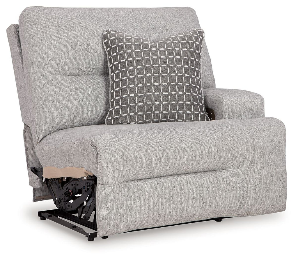Pewter fabric power recliner with armrest and patterned back throw pillow