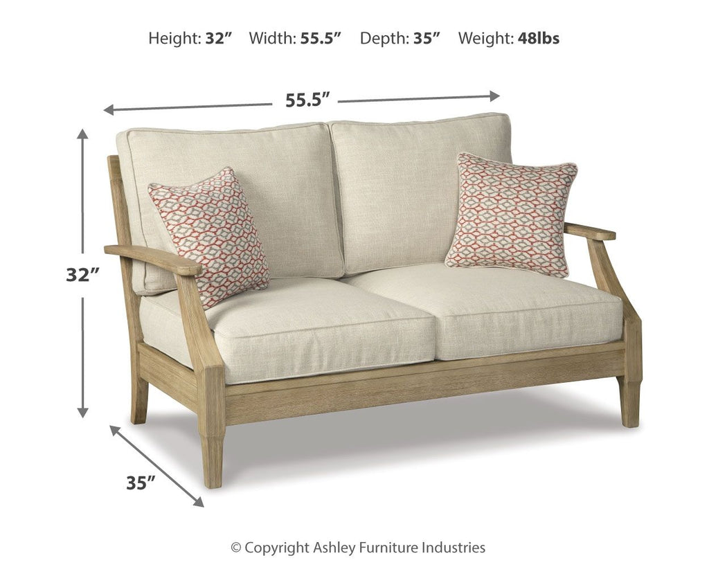 Beige loveseat with two throw pillows and armrest sofa frame, size shown
