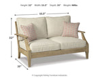 Beige loveseat with two throw pillows and armrest sofa frame, size shown