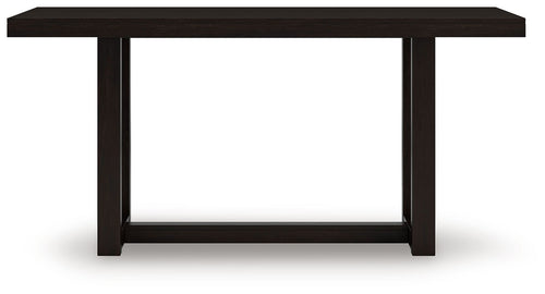 Rectangular dining room counter table with dark frame and tabletop