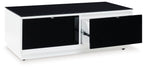 Rectangular cocktail table with white base, open black drawer, and dark tabletop