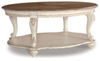 Oval cocktail table with white distressed frame and brown tabletop with curved edges