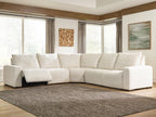 White power reclining sectional sofa with L-shaped layout and wide cushioned back