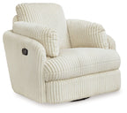 Ivory corduroy swivel glider recliner with ribbed upholstery and rounded arms.