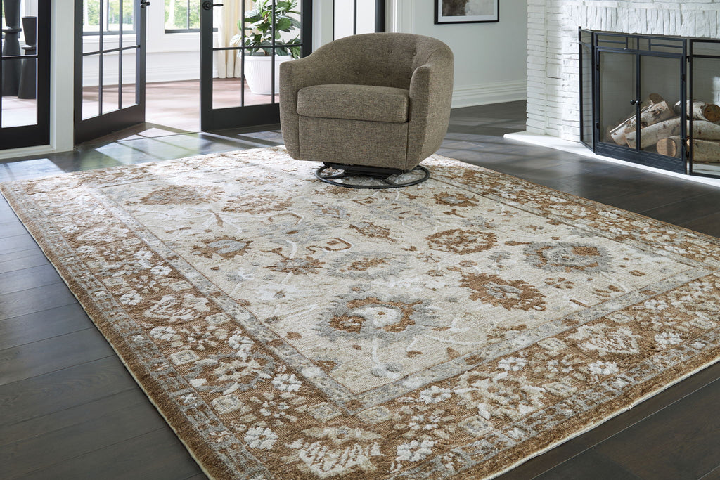 Memory foam rug corner view, light cream base with dark brown pattern throughout