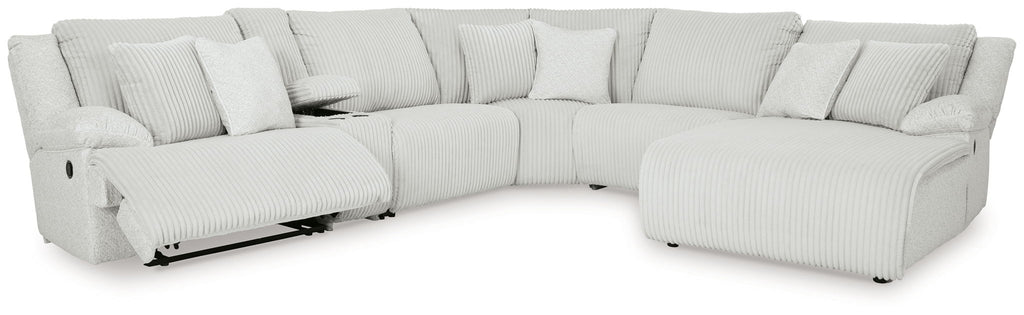 Light gray reclining sectional sofa with chaise and tall back pillows