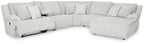 Light gray reclining sectional sofa with chaise and tall back pillows