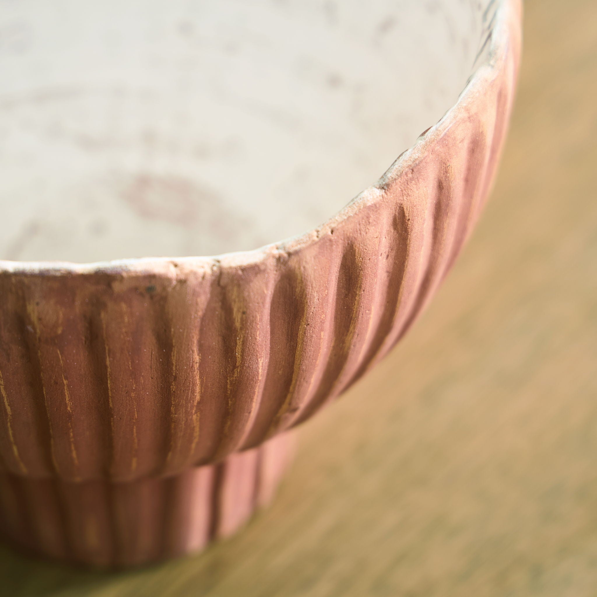 Sienna ribbed vase rim with speckled white interior