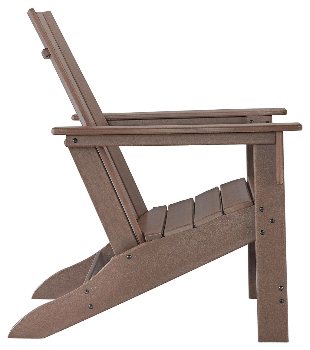 Brown Adirondack chair with slatted back, armrests, and wide seat.