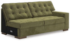 Olive green RAF sofa with tufted back cushions and padded seat, track arms