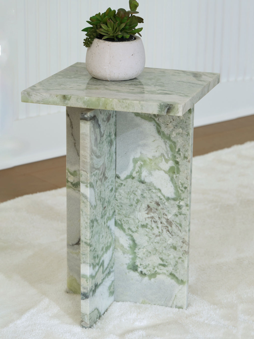 Marble-look accent table with square top, leg sides and green veining