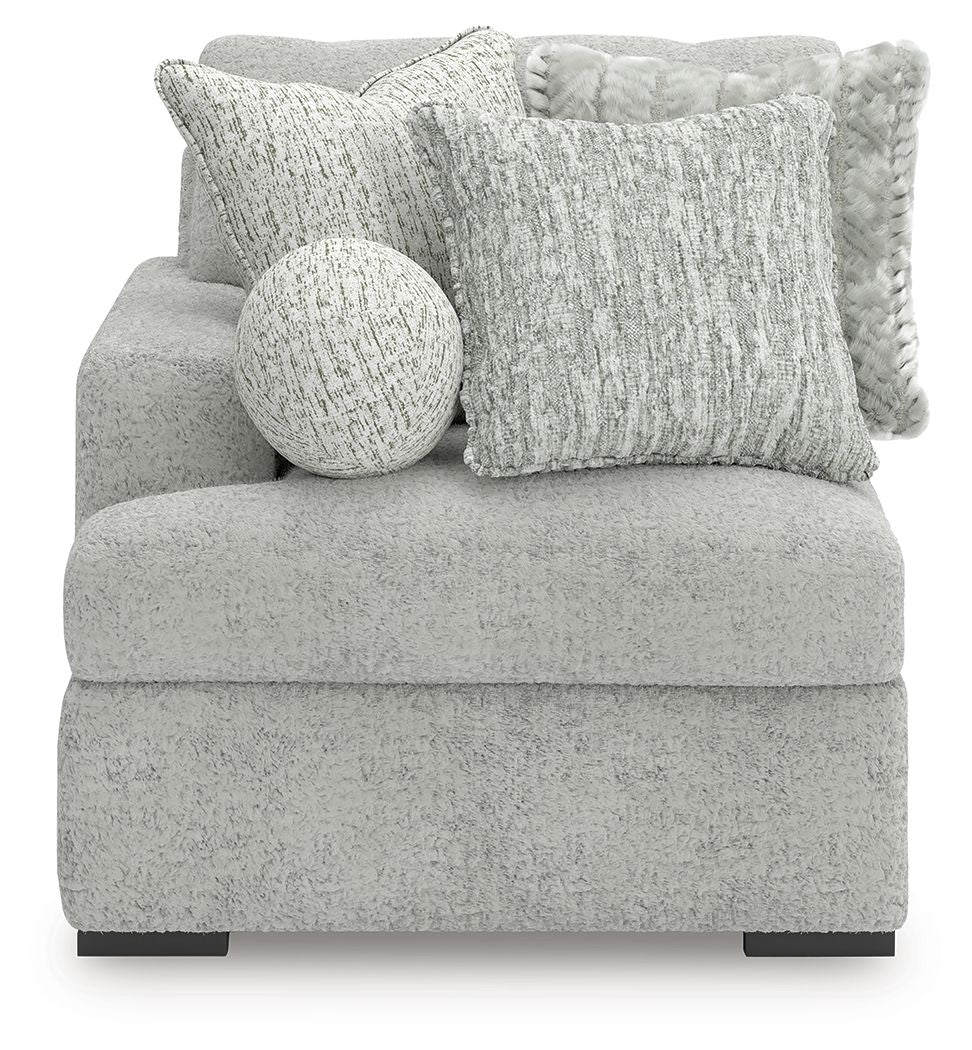 Corner chair with left arm, arctic light-gray textured upholstery and round accent pillow