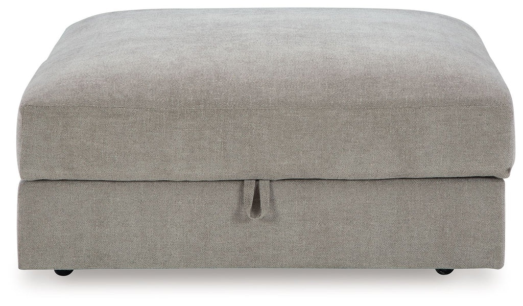 Pebble gray storage ottoman front view with hinged lid and pull tab
