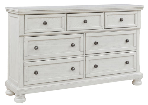 Antique white dresser with six drawers and round knob pulls in three top and three bottom.