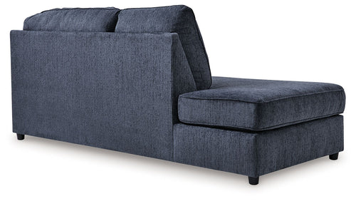 Cobalt blue left-facing corner chaise with square armrest and deep cushioned seat