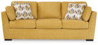Sunflower sofa sleeper with three-seat cushions and two patterned throw pillows