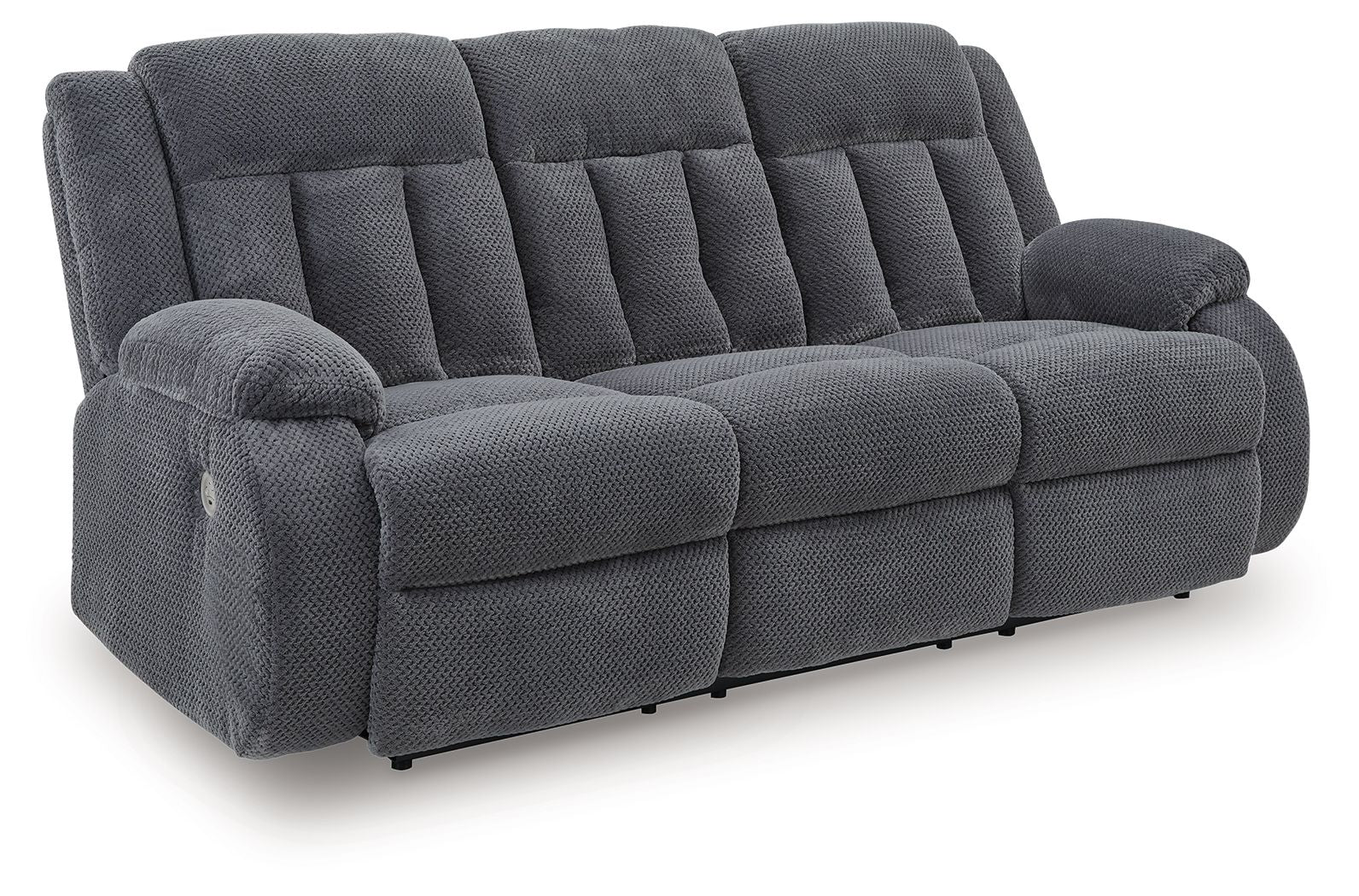 Reclining power sofa, dark gray tufted fabric, padded arms and reclined seat
