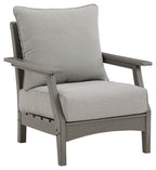 Gray lounge chair with back and seat cushions, padded armrest, wooden frame