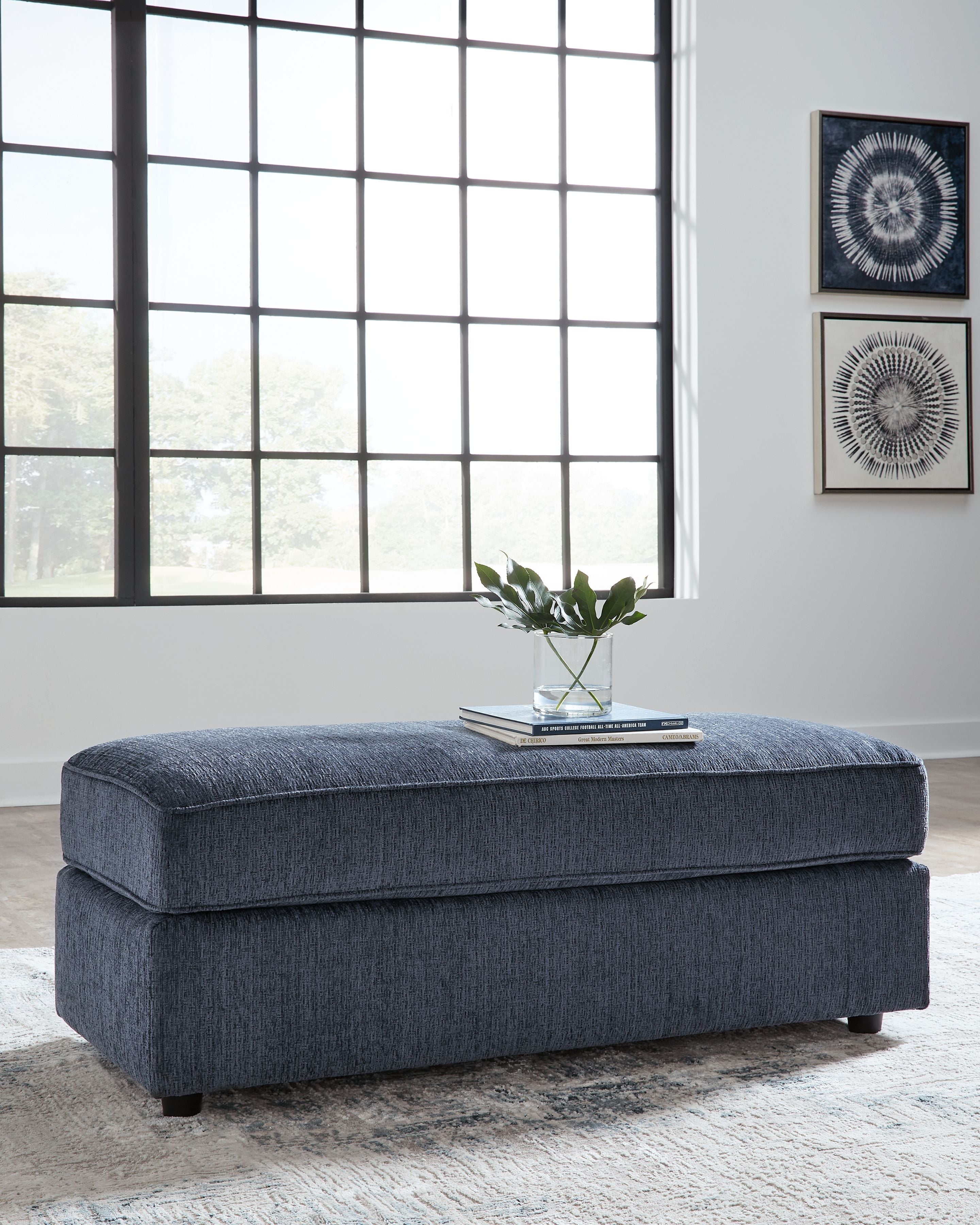 Oversized accent ottoman in cobalt blue with rounded rectangular top and low legs