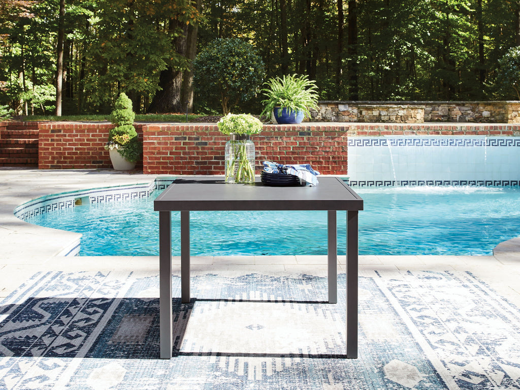 Gray square outdoor dining table with smooth top and four straight legs