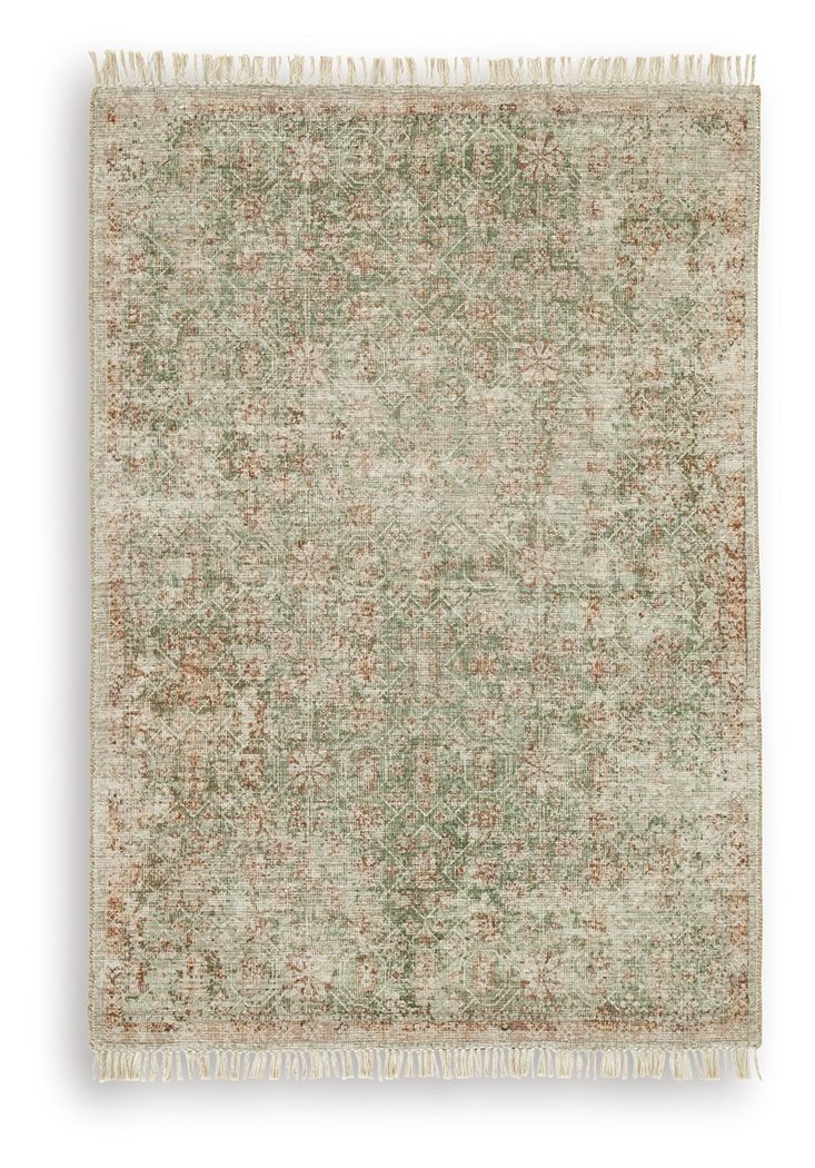 Rossbury rug with light beige base, green flecks and rust accents, fringed edge