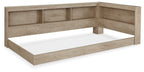 Beige storage bed with low frame and built-in headboard shelves
