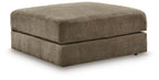 Coffee-toned fabric ottoman with storage, square padded top and low skirted base