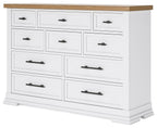 White dresser with black bar handles and natural wood top, multi-drawer front.
