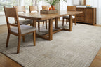 Gray area rug with textured geometric pattern