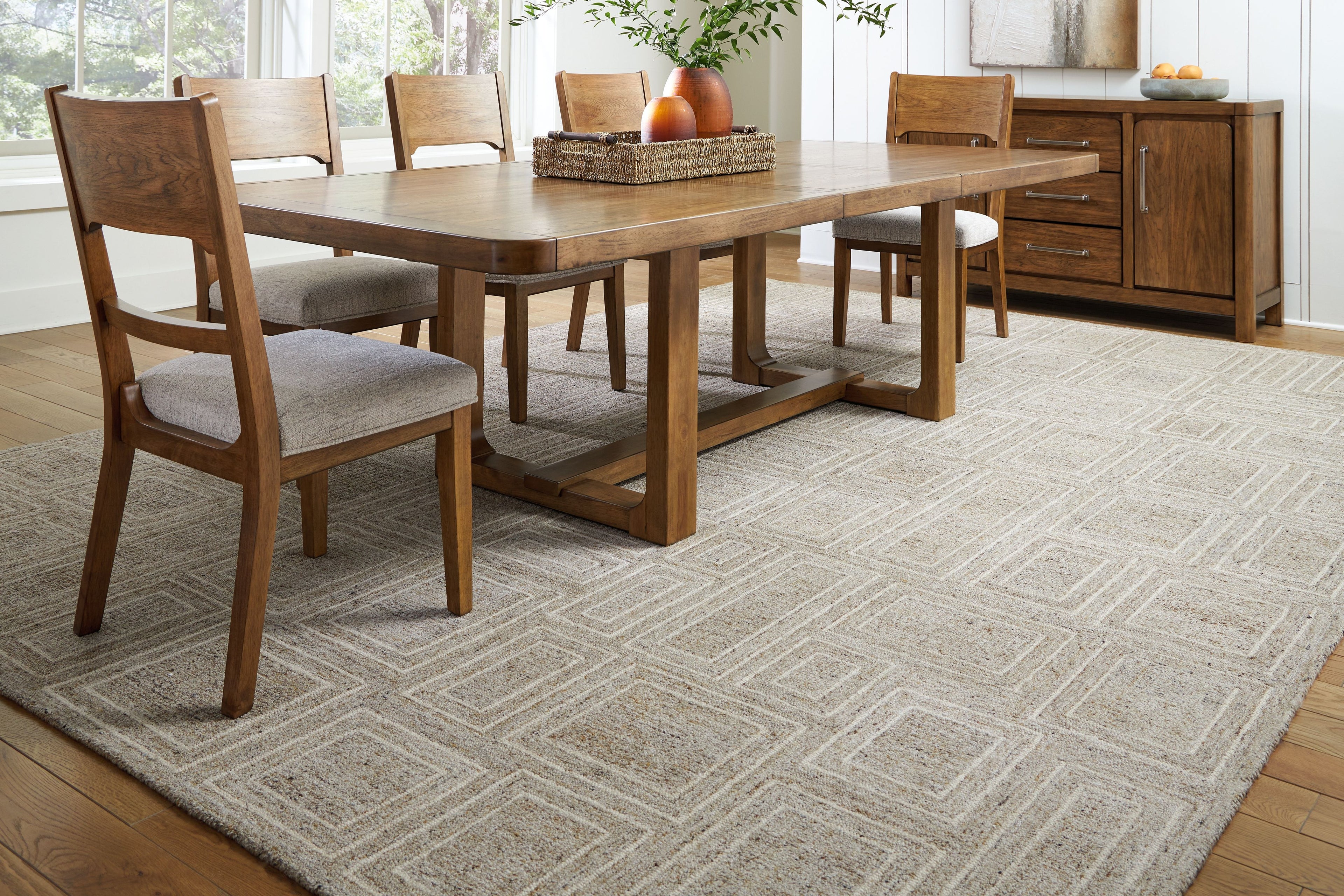 Gray area rug with textured geometric pattern