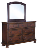 Porter dresser with arched mirror frame in rustic brown, multiple drawers with knobs