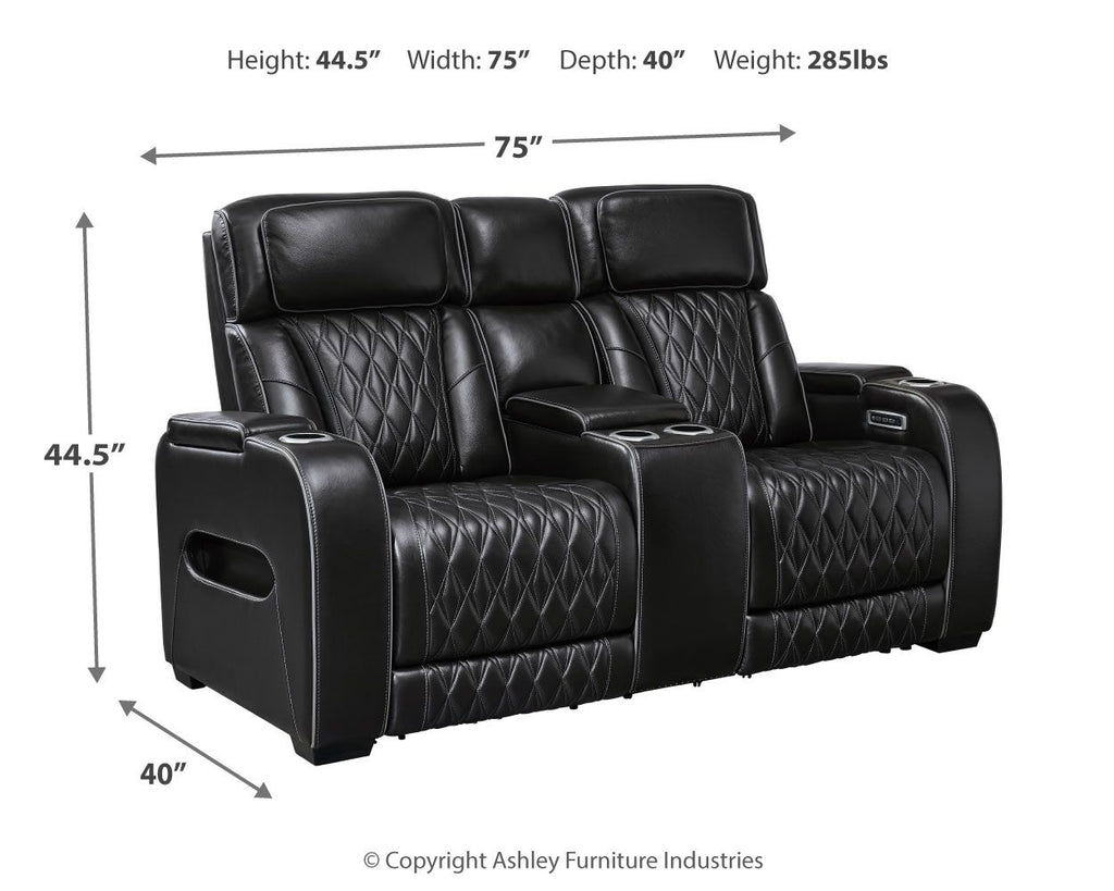 Black power reclining loveseat with console, quilted upholstery, and adjustable headrests