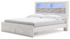 White king upholstered bookcase bed with tufted headboard and two front drawers